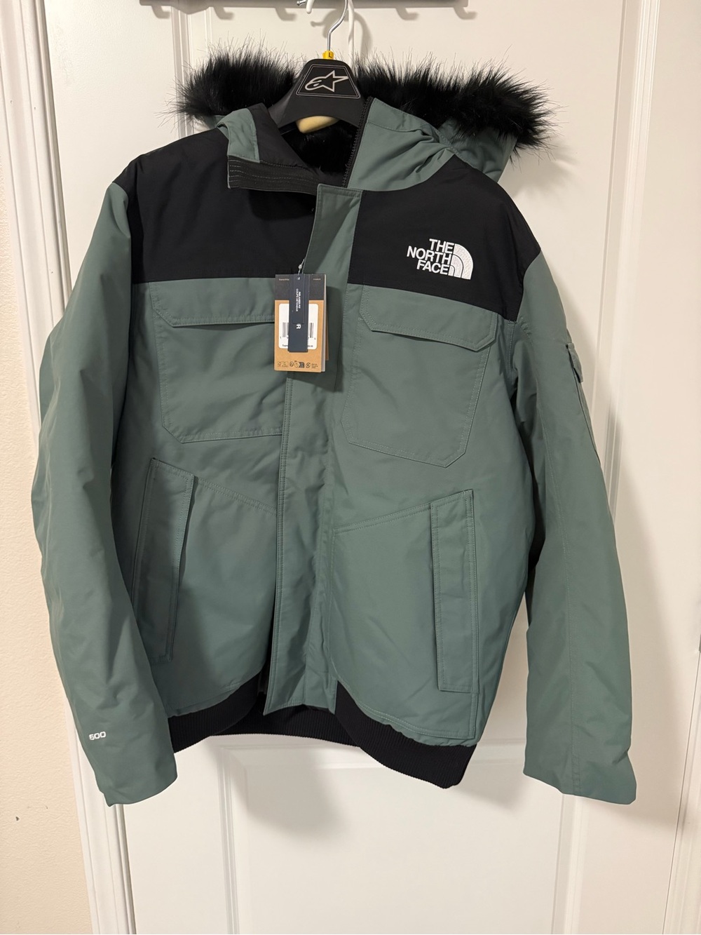 The North Face Men's Hooded Puffer Jacket in Sage Green and Black